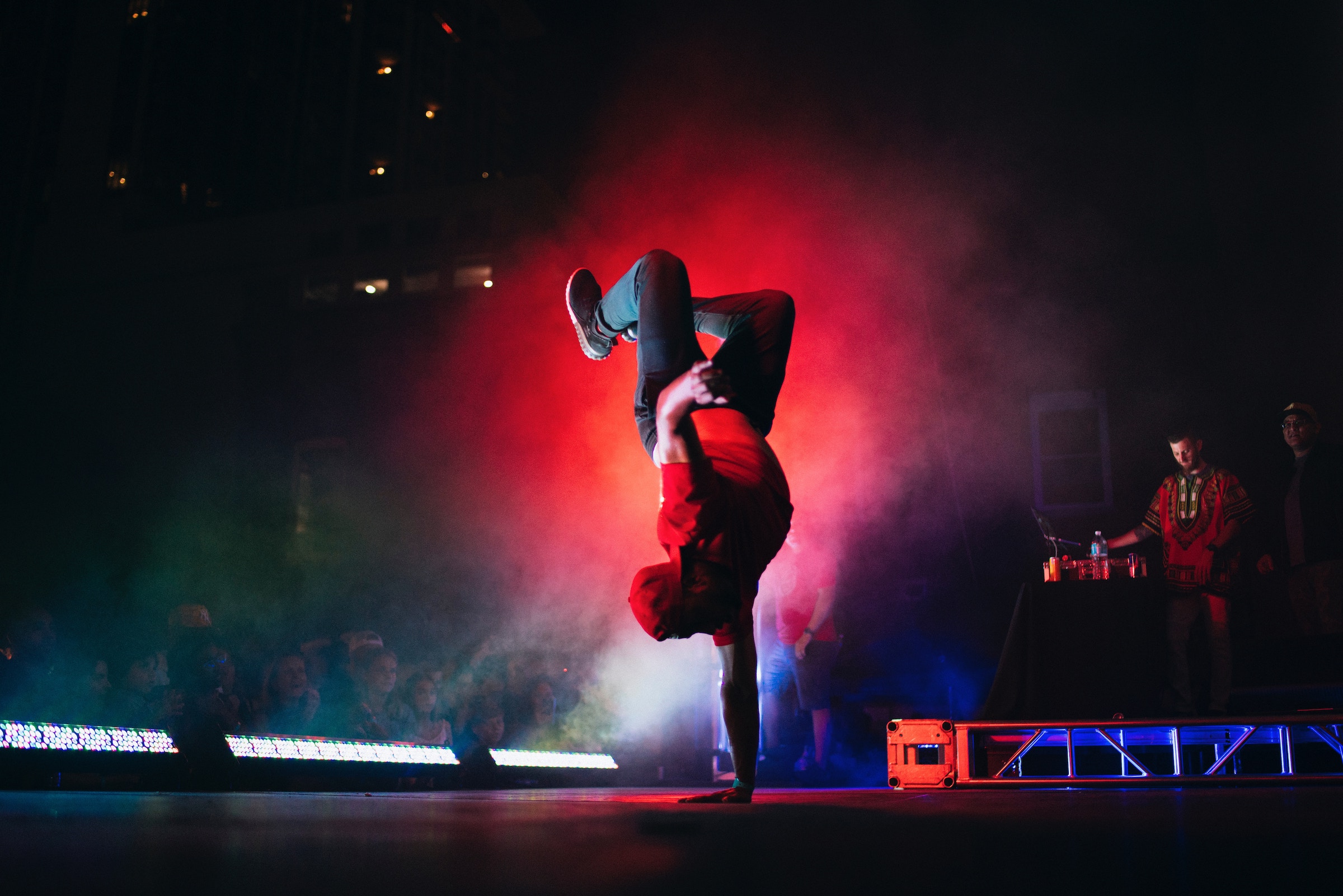 Breakdancer standing on one hand